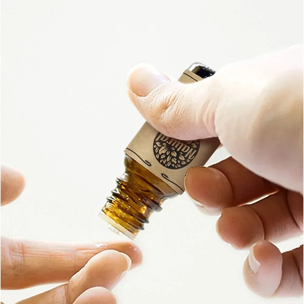 Bottle of rosemary essential oil — image 3