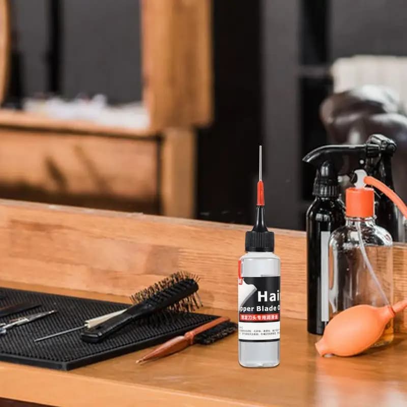 bottle of hair clipper lubricant oil — image 2