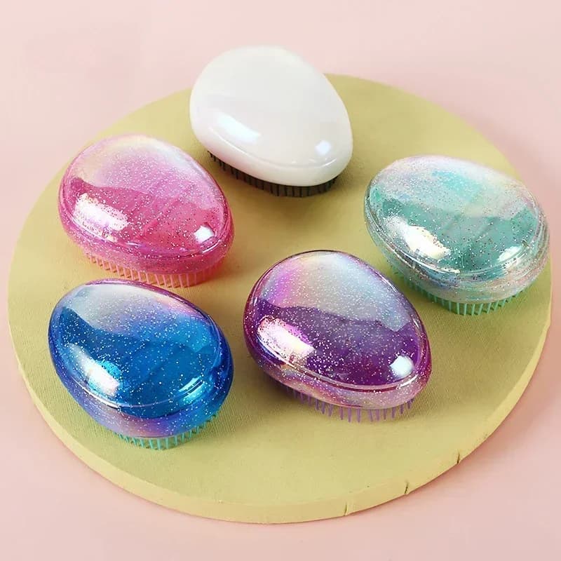 egg-shaped mini detangling hair brush — image 4