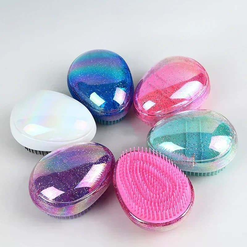 egg-shaped mini detangling hair brush — image 1