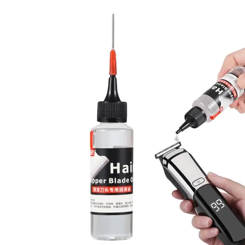 bottle of hair clipper lubricant oil — image 1