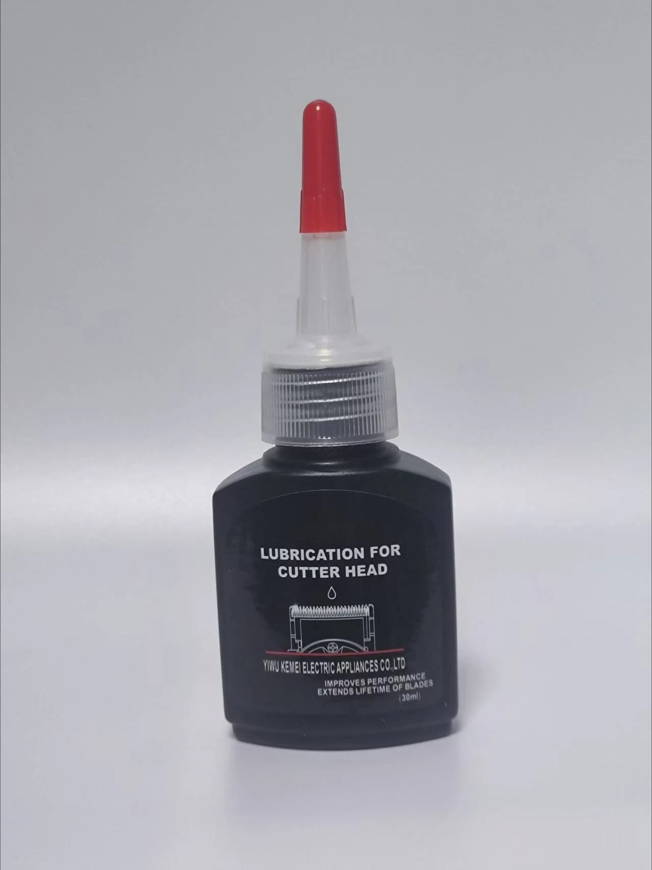 bottle of hair trimmer lubricant oil — image 7