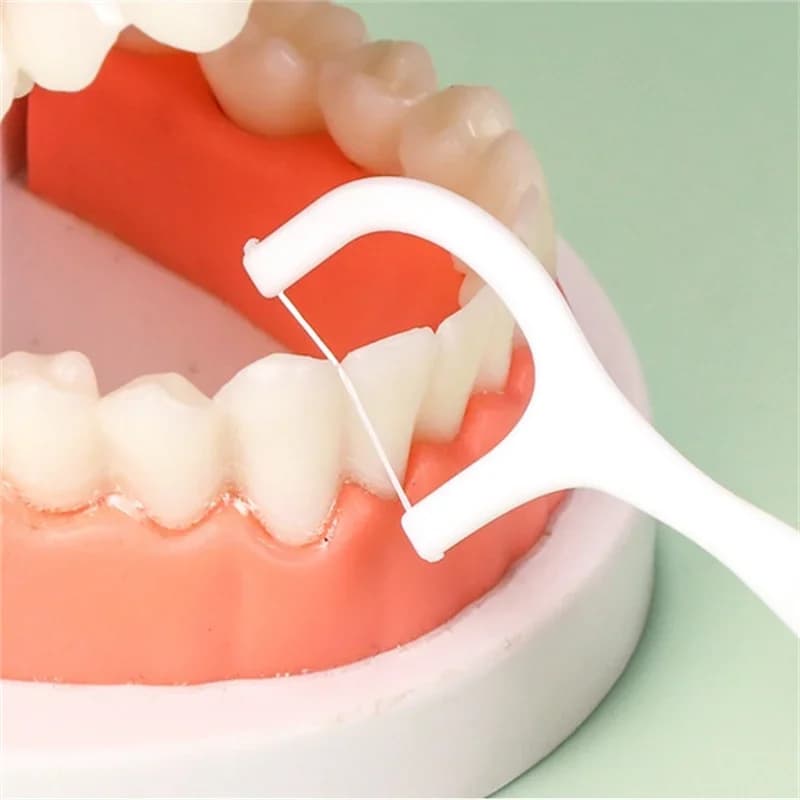 Disposable plastic dental floss toothpick — image 5