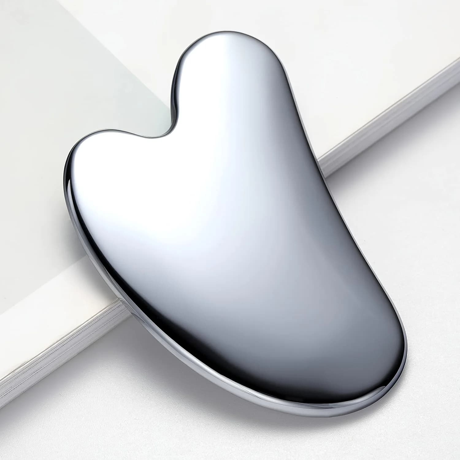 Stainless steel dolphin-shaped Gua Sha facial massage tool — image 5