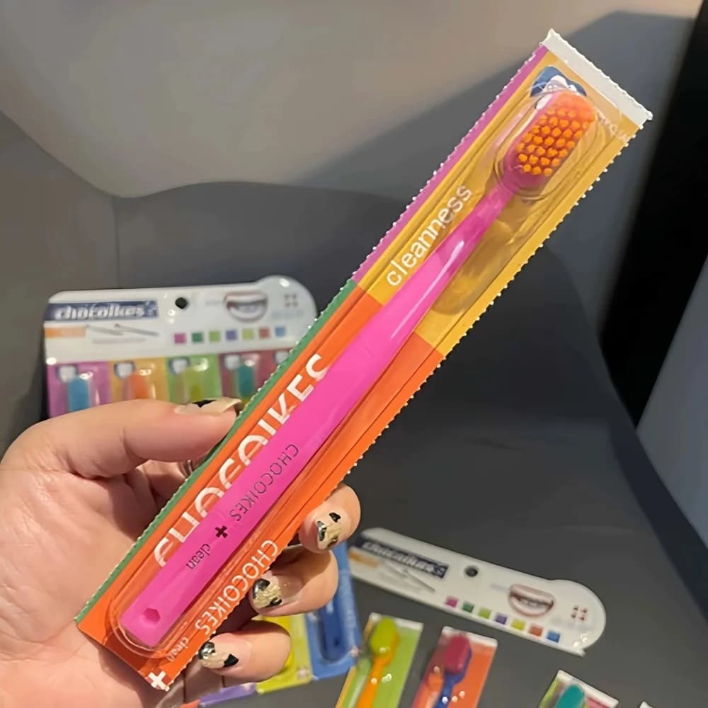 Five soft pastel toothbrushes in a travel case — image 5