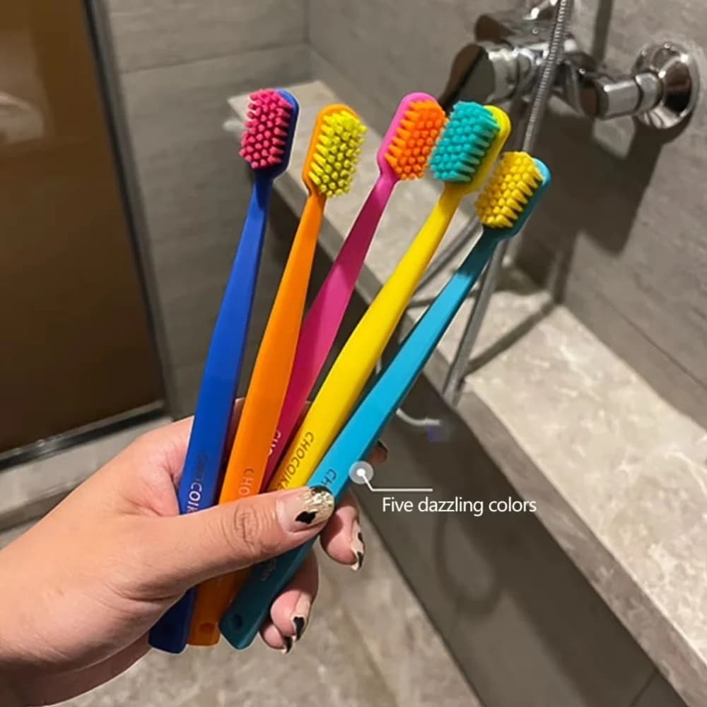 Five soft pastel toothbrushes in a travel case — image 4