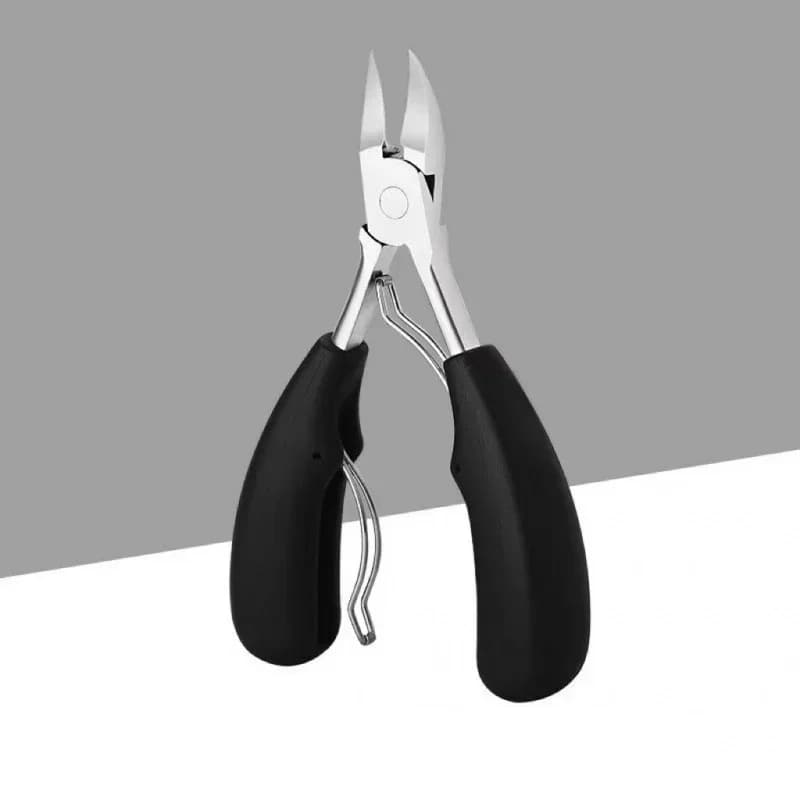 Toe nail clipper with curved blade — image 8