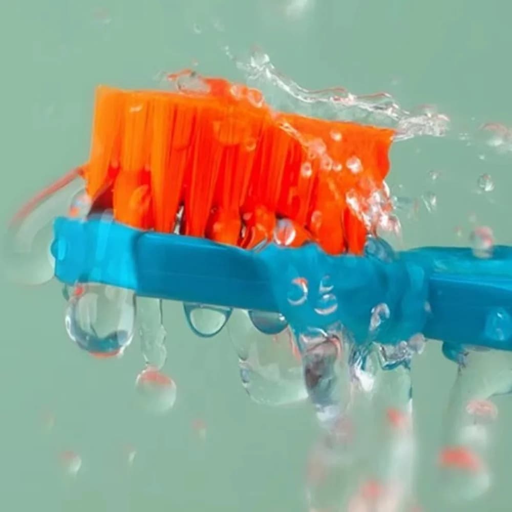 Five soft pastel toothbrushes in a travel case — image 3