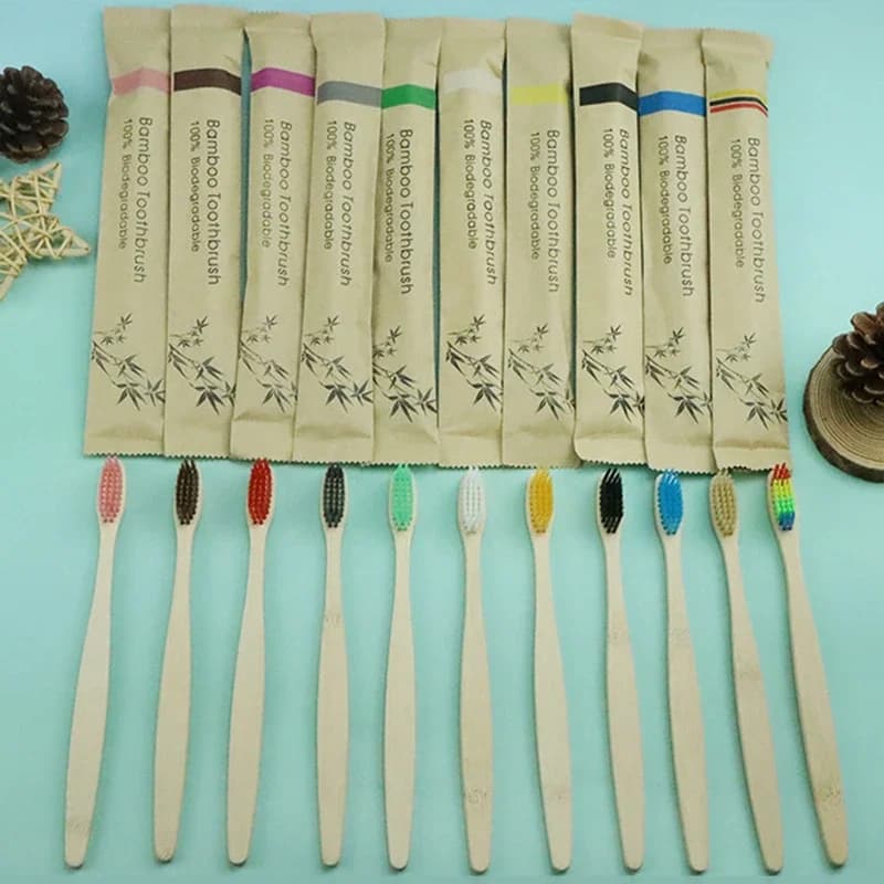 Set of 10 colorful bamboo toothbrushes with soft charcoal bristles — image 1