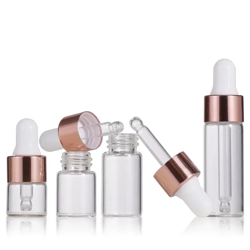 set of 10 mini glass dropper bottles with rose gold caps — image 4