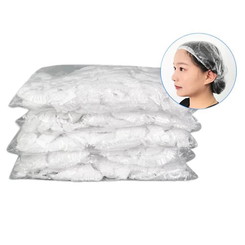 Disposable plastic shower hair caps in pink — image 5