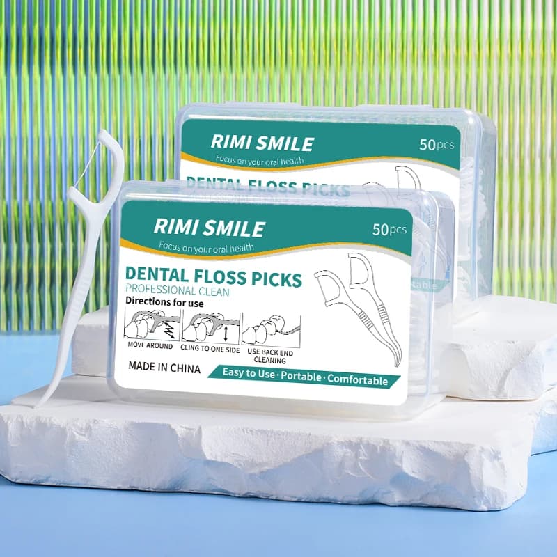 Box of dental floss sticks — image 4