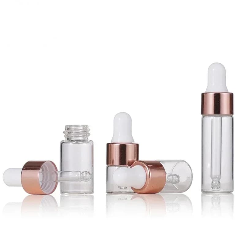set of 10 mini glass dropper bottles with rose gold caps — image 5