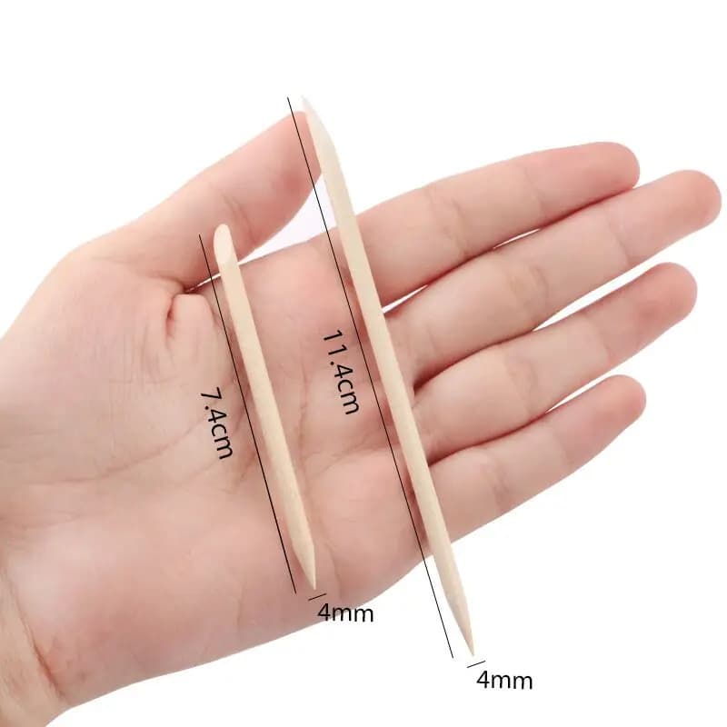 orange wood nail art and cuticle pushers — image 6