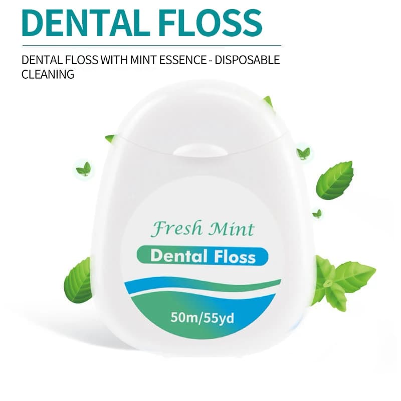 white box of mint dental floss roll — image 5