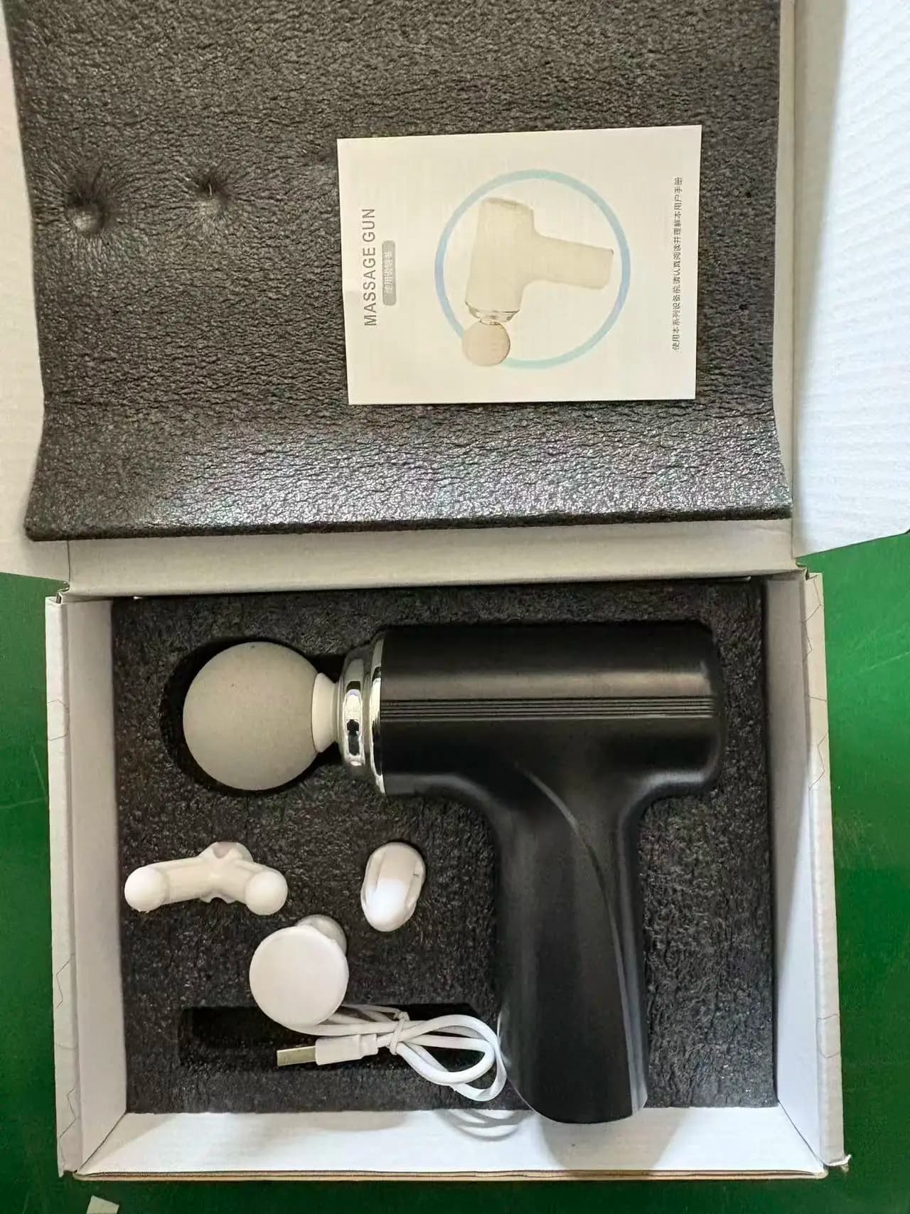 portable massage gun with interchangeable heads and LED display — image 7