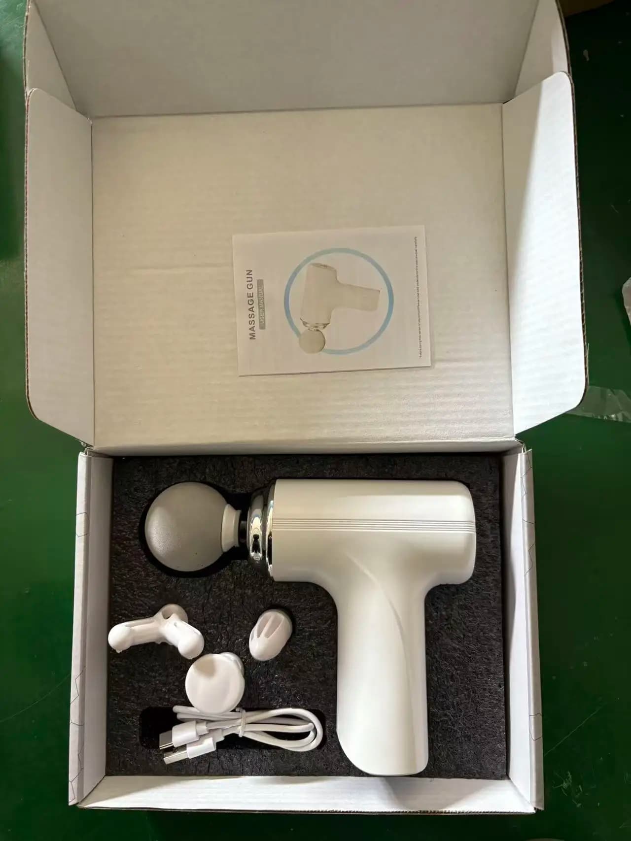 portable massage gun with interchangeable heads and LED display — image 8