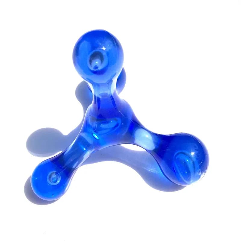 Four mini manual massage balls of different sizes — image 4