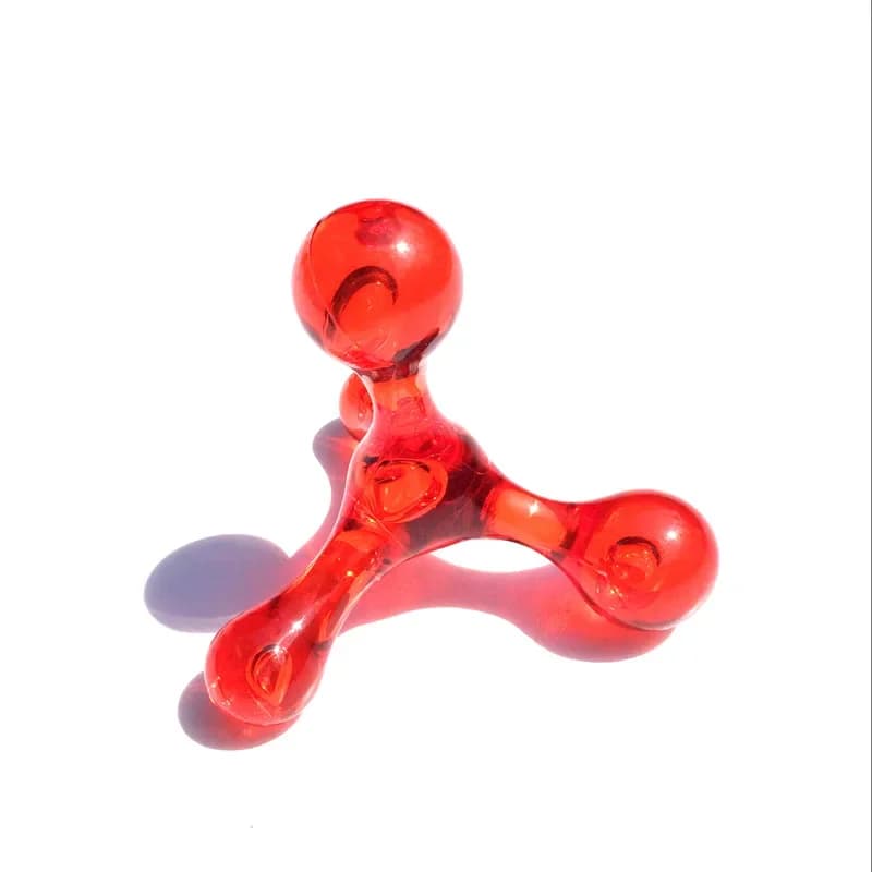 Four mini manual massage balls of different sizes — image 7