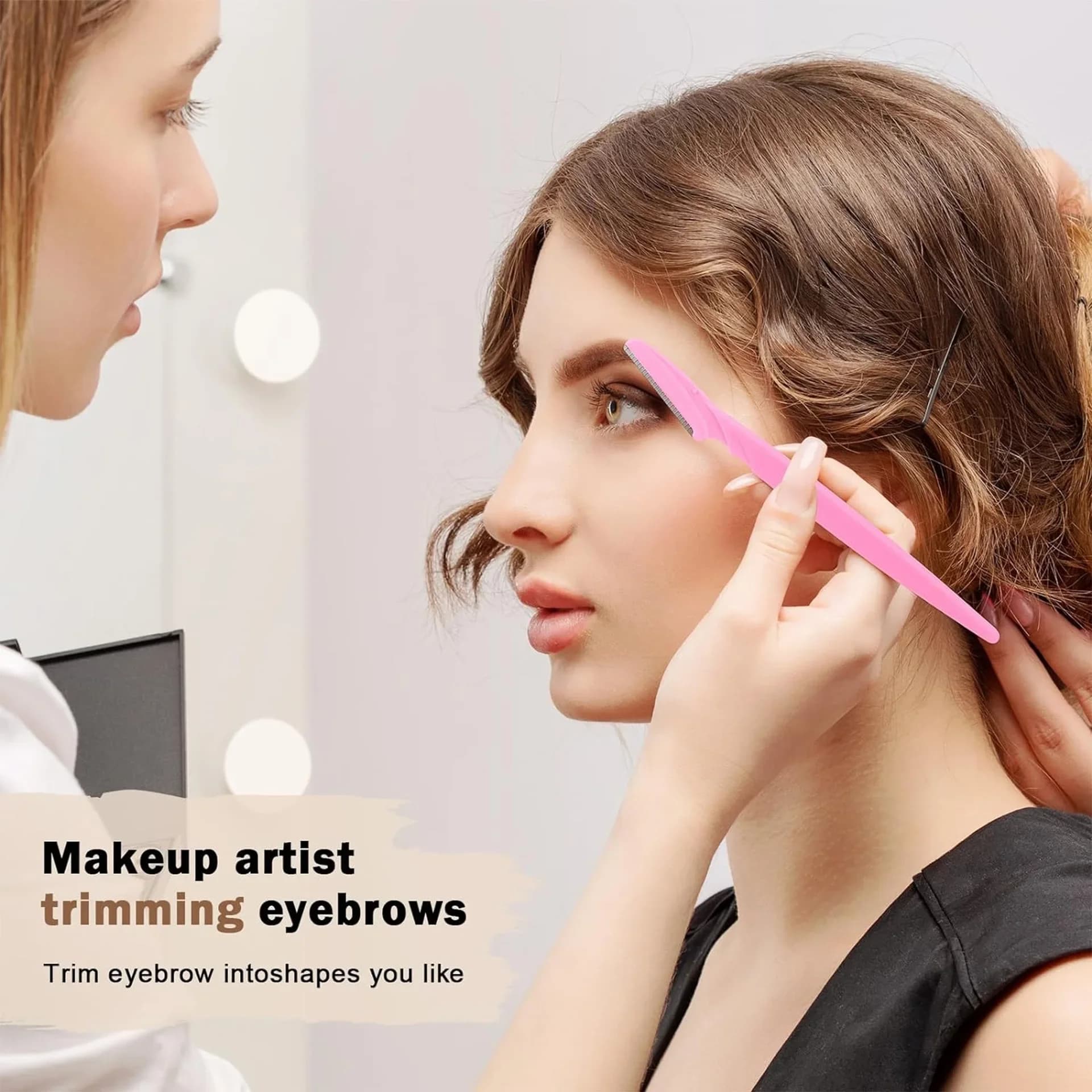 hand holding eyebrow trimmer — image 2