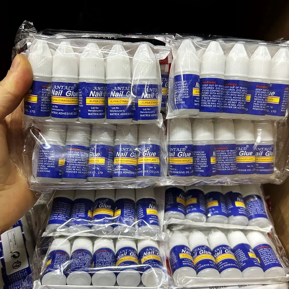 bottle of nail bond glue — image 6