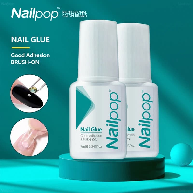 glitter nail glue bottle with brush cap — image 1