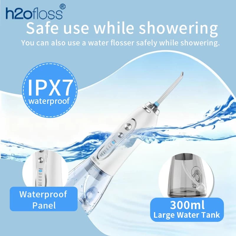 cordless water flosser with reservoir and tips — image 5