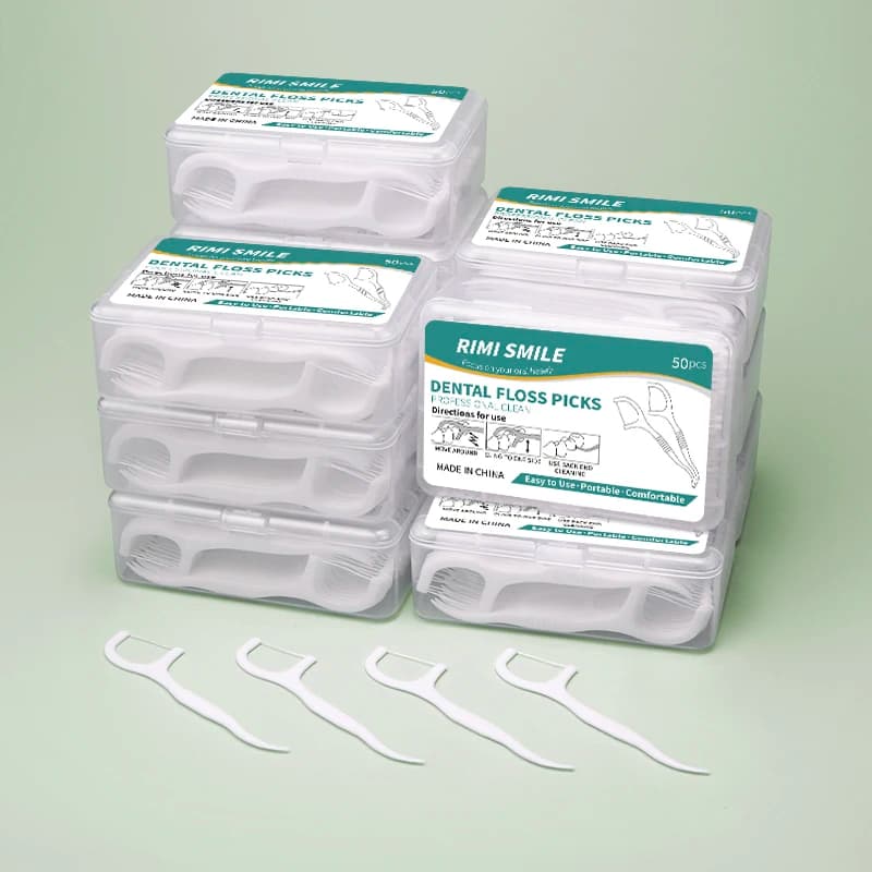 Box of dental floss sticks — image 6