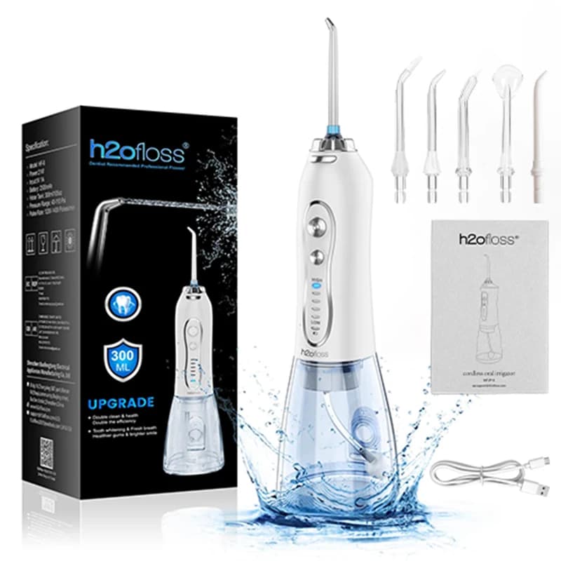 cordless water flosser with reservoir and tips — image 8