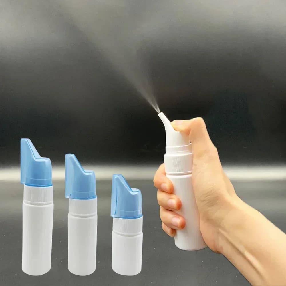 Portable nasal irrigator bottle with fine mist spray nozzle — image 1